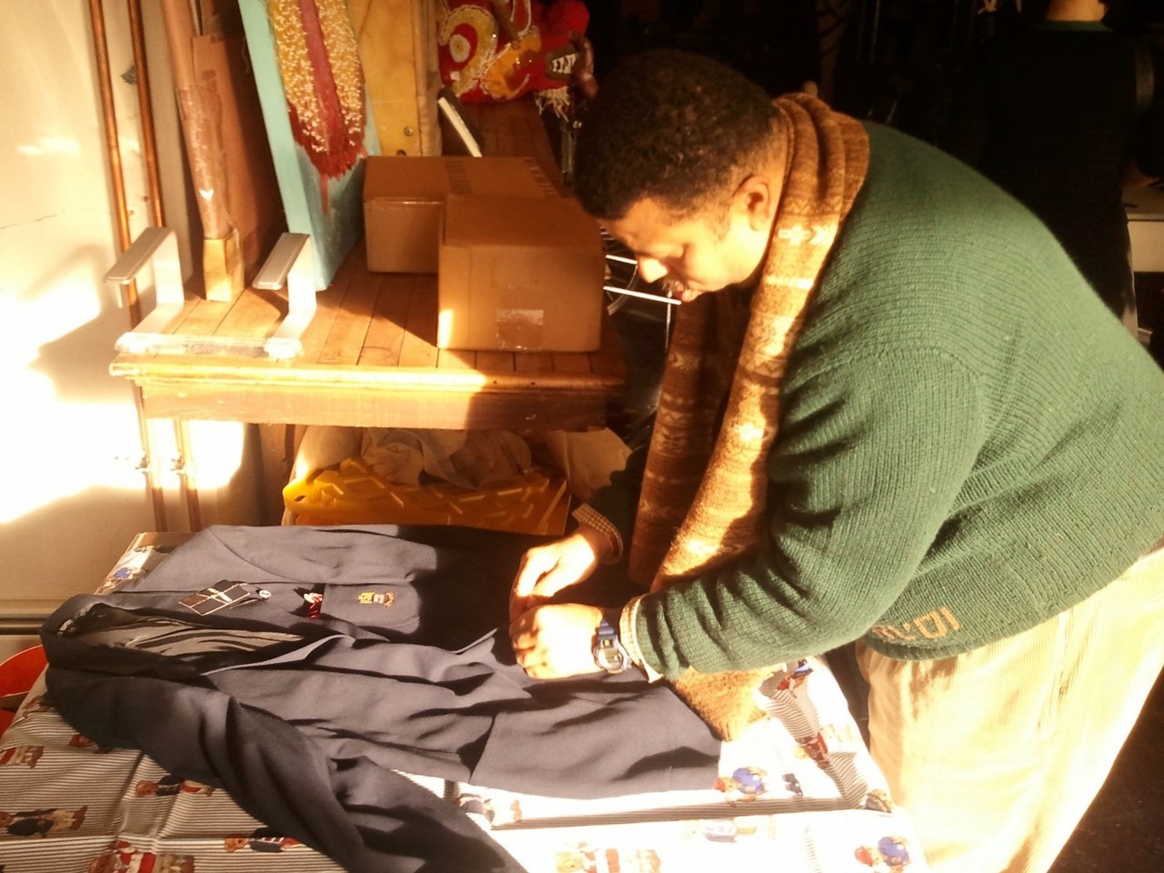 Dallas Penn adjusts a few of the 1000+ pieces in his Polo collection